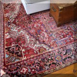 DR07. Handknotted wool rug. Measures approx. 9' x 12' 